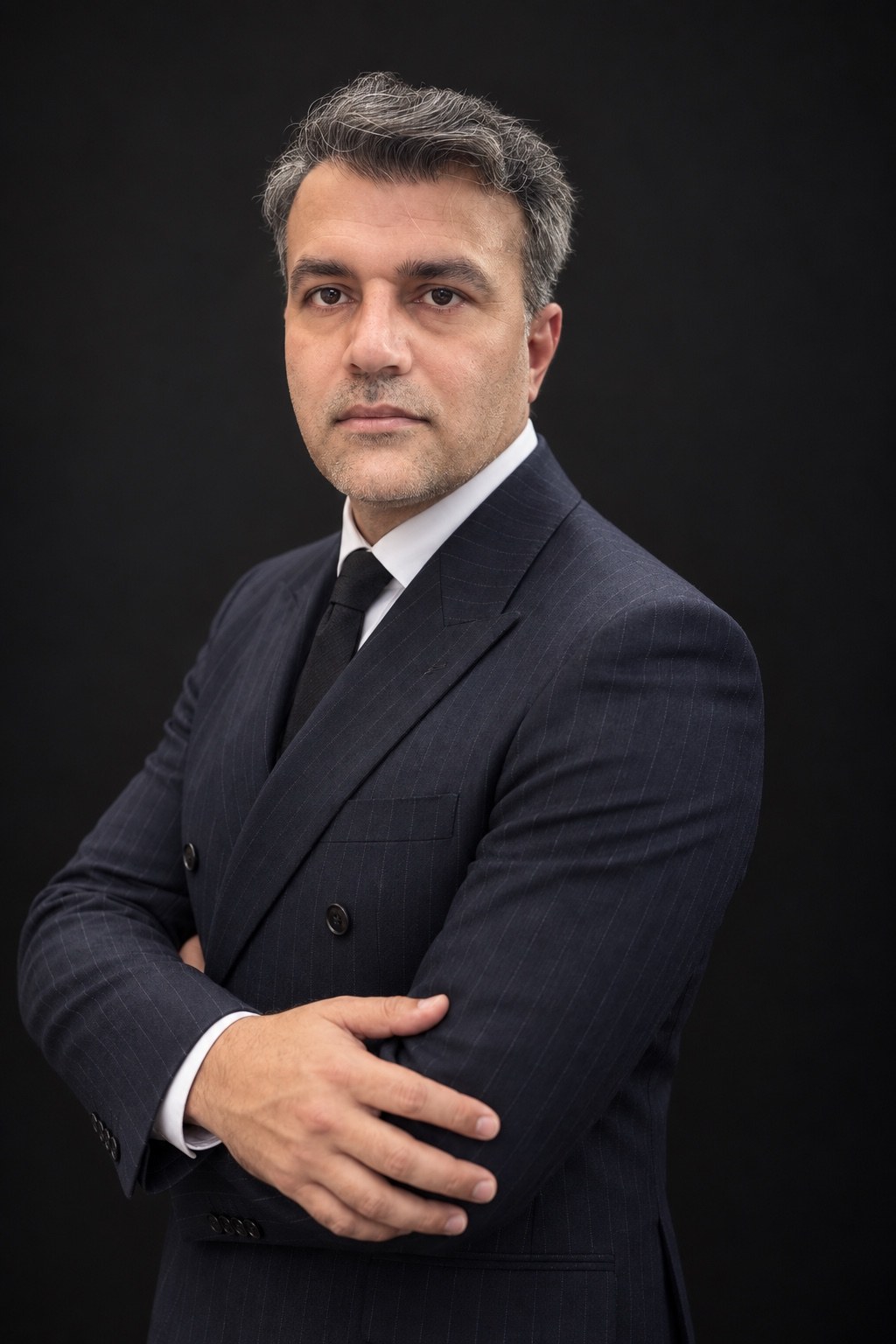 Dr Zubair Popalzai in formal professional portrait